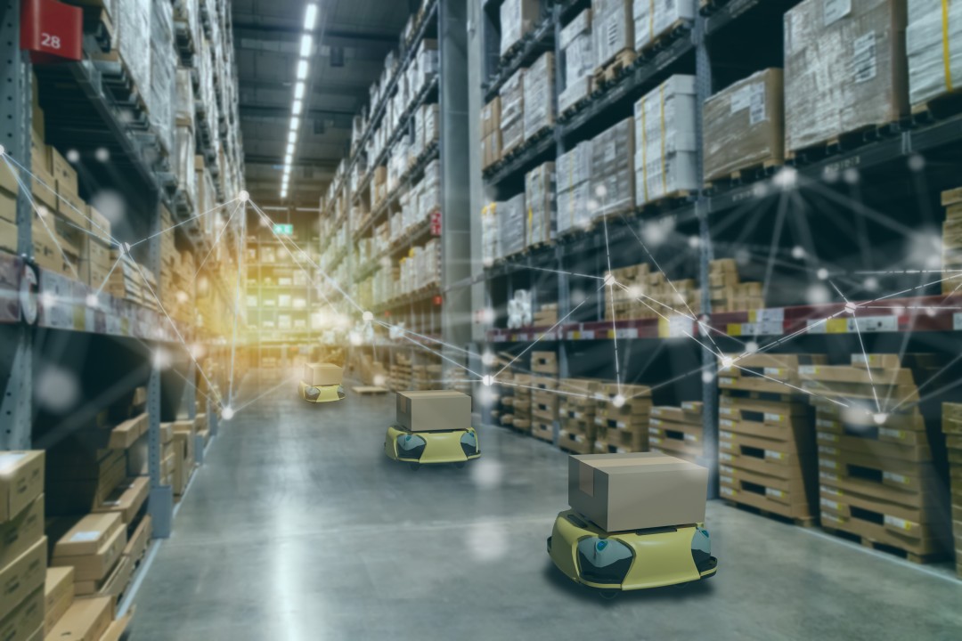 Industrial factory floor — the physical asset class that digital twins virtualize for monitoring, simulation, and optimization.